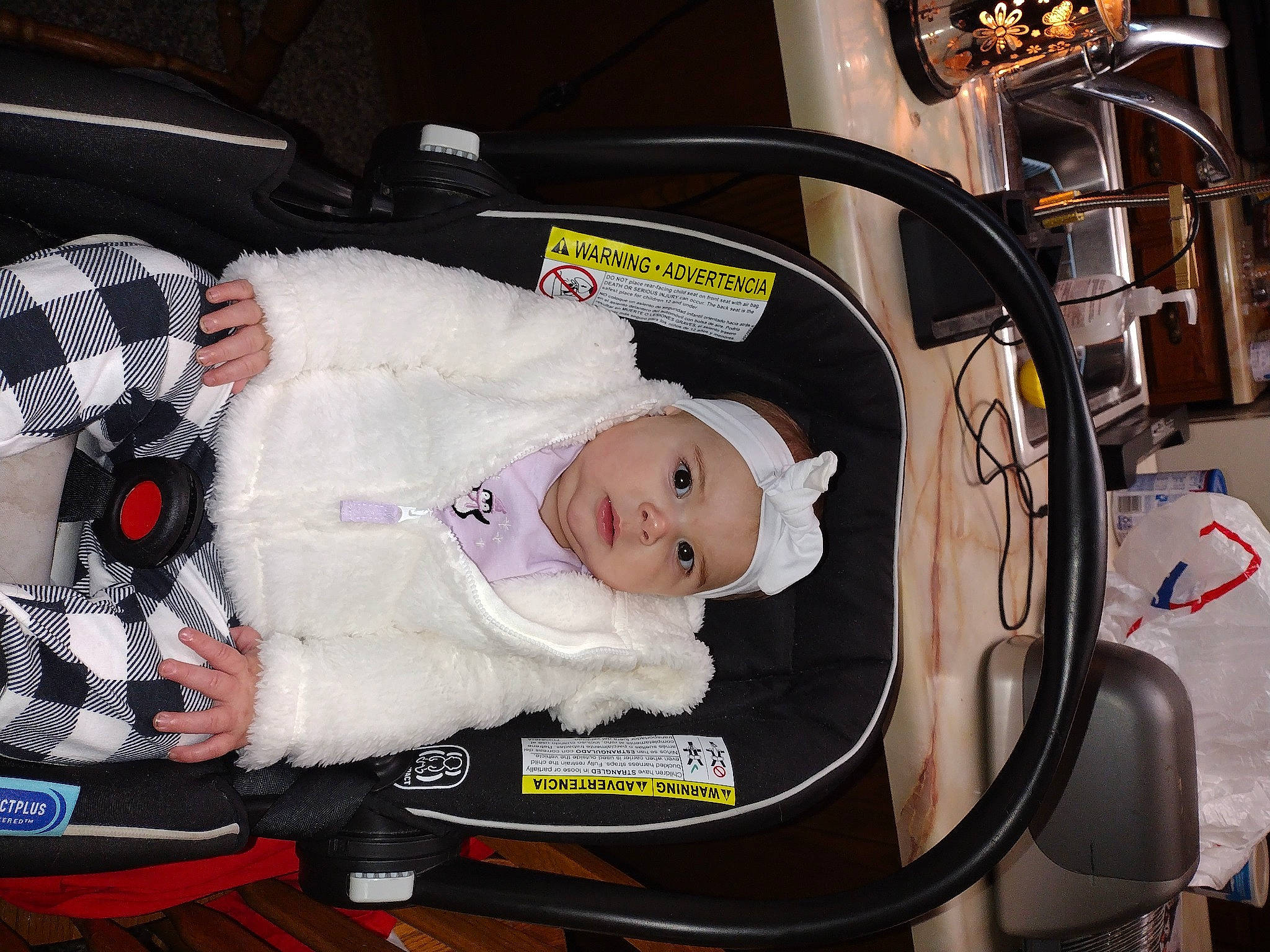 Addelynn is registered to the contest to win money with this photo: baby, baby_carriage, baby_products, baby_safety, baby_toddler_clothing, car_seat, child, comfort, headwear, lap, motor_vehicle, person, service, sitting, tire, toddler, vehicle