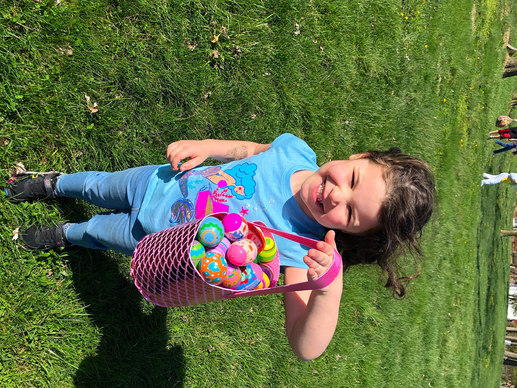 Alayah is registered to the contest to win money with this photo: ball, botany, fun, grass, grass_family, grassland, green, happy, joy, lawn, leaf, leisure, mammal, meadow, natural_environment, people_in_nature, person, recreation, smile, summer