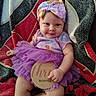 baby, blanket, child, clothing, cute, face, hand, happy, headband, indoors, infant, legs, milestone, person, portrait, purple_tutu, sitting, smile, three_months, wooden_sign