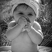 Eveyln joined the competition — help win amazing prizes! accessories, baby, bodypart, bonnet, clothing, face, finger, flower, food, hand, happy, hat, head, person, petal, photography, plant, portrait, smile, swimwear