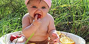 Eveyln joined the competition — help win amazing prizes! baby, bathing, citrusfruit, eating, face, flower, food, fruit, grass, head, lemon, orange, person, petal, photography, plant, portrait, pottedplant, produce, summer