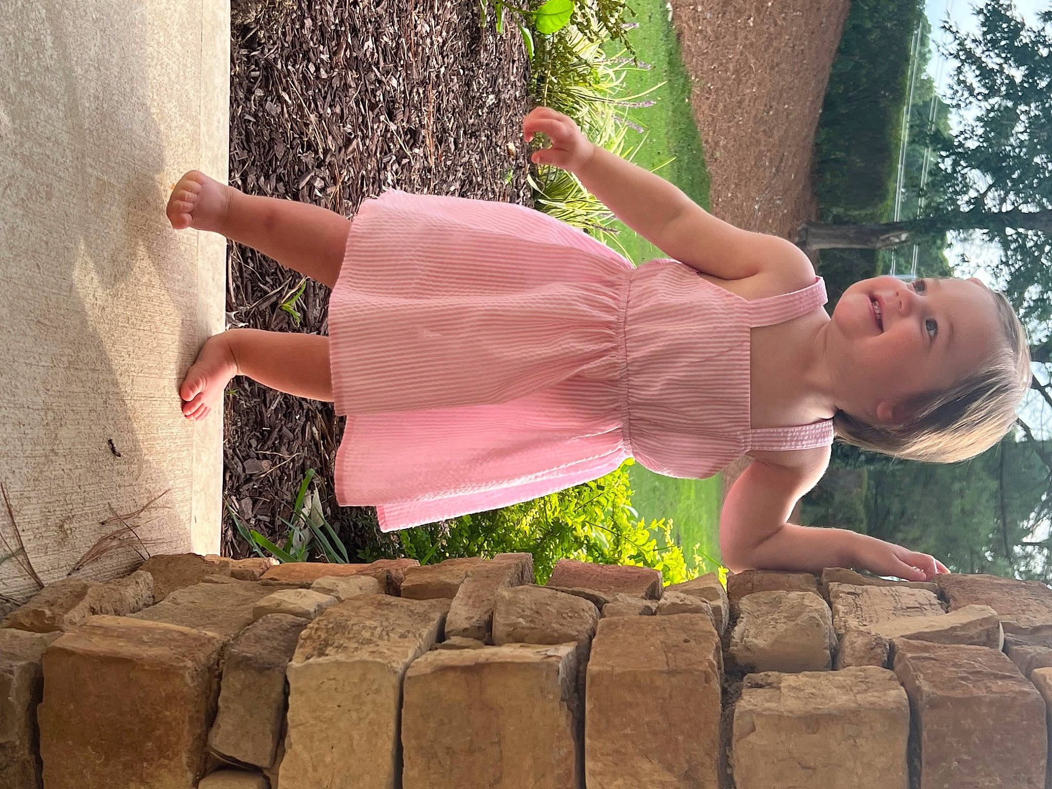 Caroline is registered to the contest to win money with this photo: arm, dress, flash_photography, fun, grass, green, hand, happy, human_body, joy, leg, leisure, light, people_in_nature, person, plant, shoulder, thigh, tree, waist