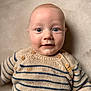 Antonn a rejoint le concours — aidez-le/la à gagner de superbes lots ! baby, infant, child, portrait, sweater, striped_sweater, blue_eyes, buttons, knitwear, close_up, cozy, reclining, fair_skin, bald_head, indoors, soft_background, cheeks, smile, looking_at_camera, baby_clothing