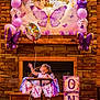 Miley joined the competition — help win amazing prizes! toddler, child, high_chair, balloon, unicorn_balloon, birthday, birthday_banner, purple_balloons, pink_balloons, stone_wall, party_decorations, butterfly, celebration, first_birthday, banner, wooden_chair, colorful, indoor, festive, cute