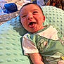 Colton joined the competition — help win amazing prizes! baby, infant, smiling, happy, cushion, blanket, clothing, indoor, child, face, person, cute, newborn, texture, comfort, soft, relaxed, home, portrait, joy