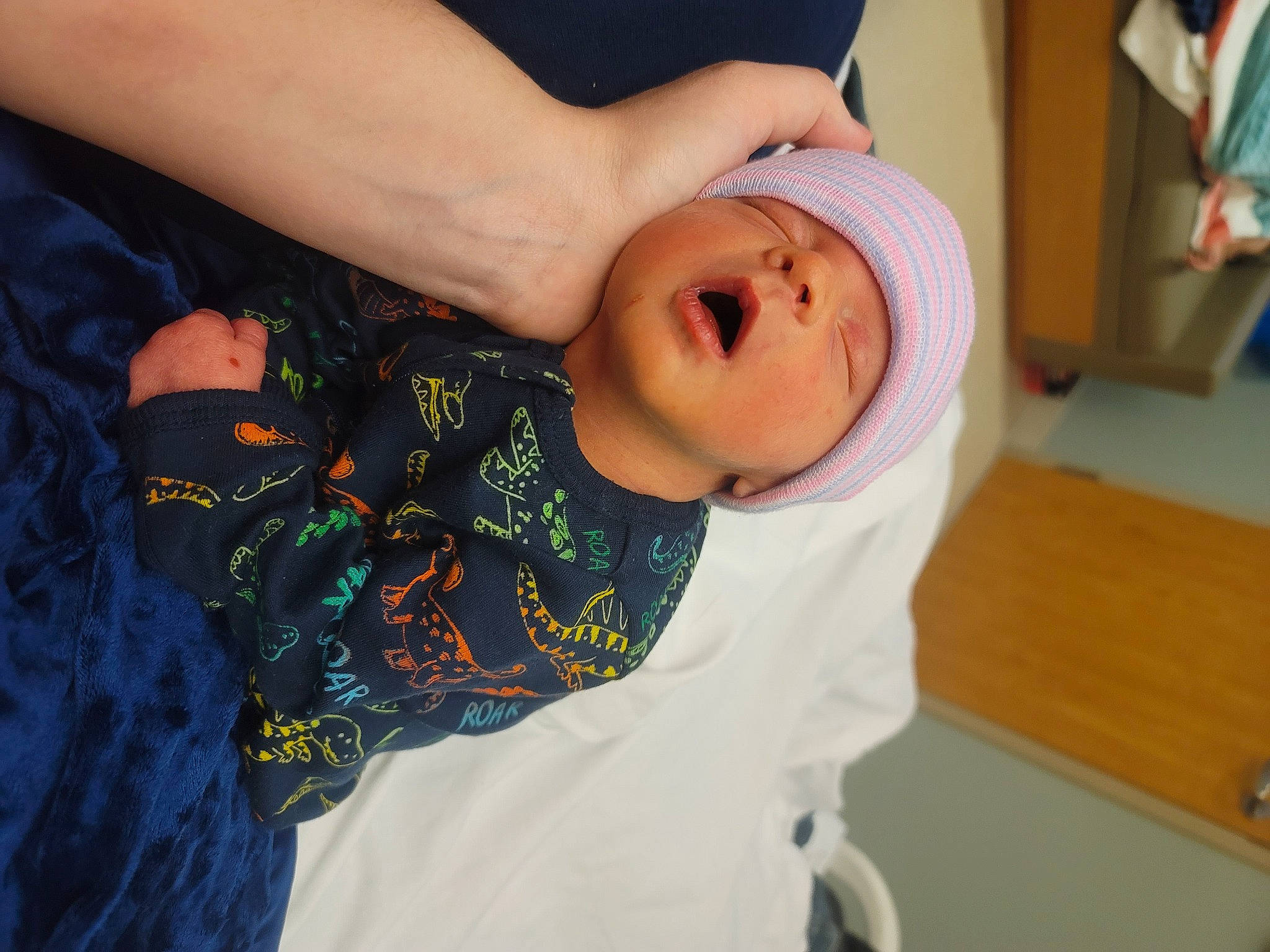 Sawyer is registered to the contest to win money with this photo: baby, baby_toddler_clothing, cheek, child, elbow, eye, eyelash, fun, happy, hat, nail, nose, pattern, person, personal_protective_equipment, service, sleeve, t_shirt, toddler