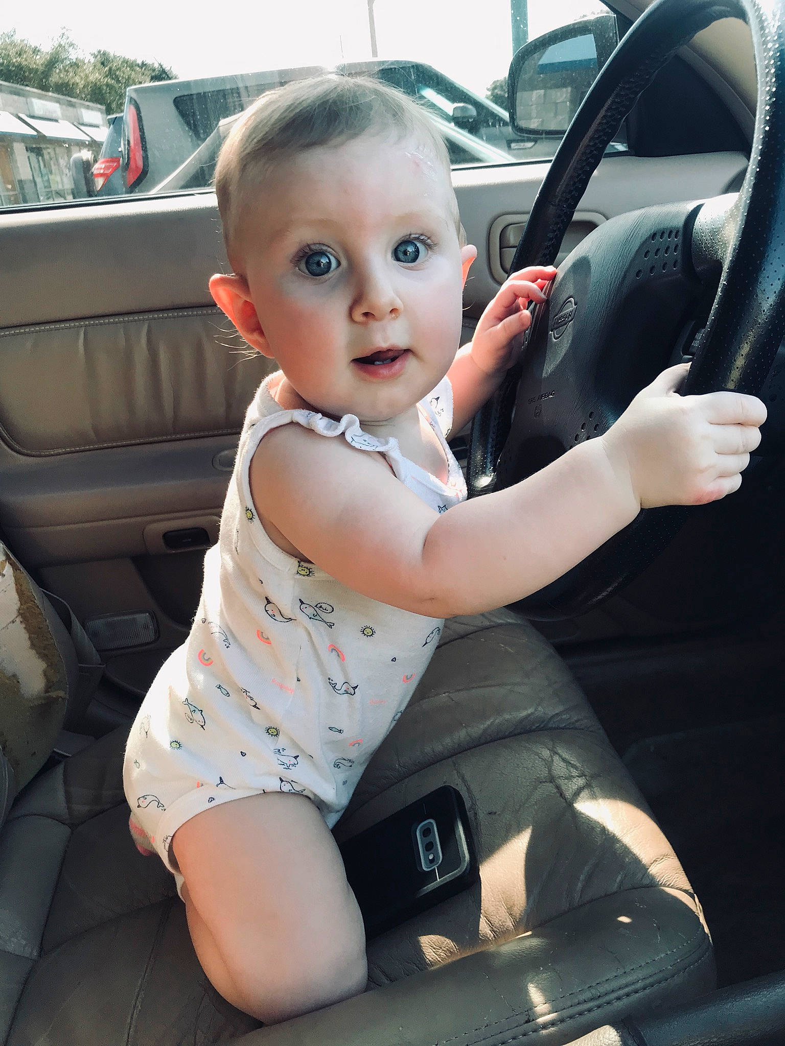 Rhiannon joined the competition — help win amazing prizes! auto_part, automotive_window_part, baby, baby_in_car_seat, car, car_seat, car_seat_cover, child, driving, family_car, person, seat_belt, sitting, steering_part, steering_wheel, surprise, toddler, vehicle, vehicle_door