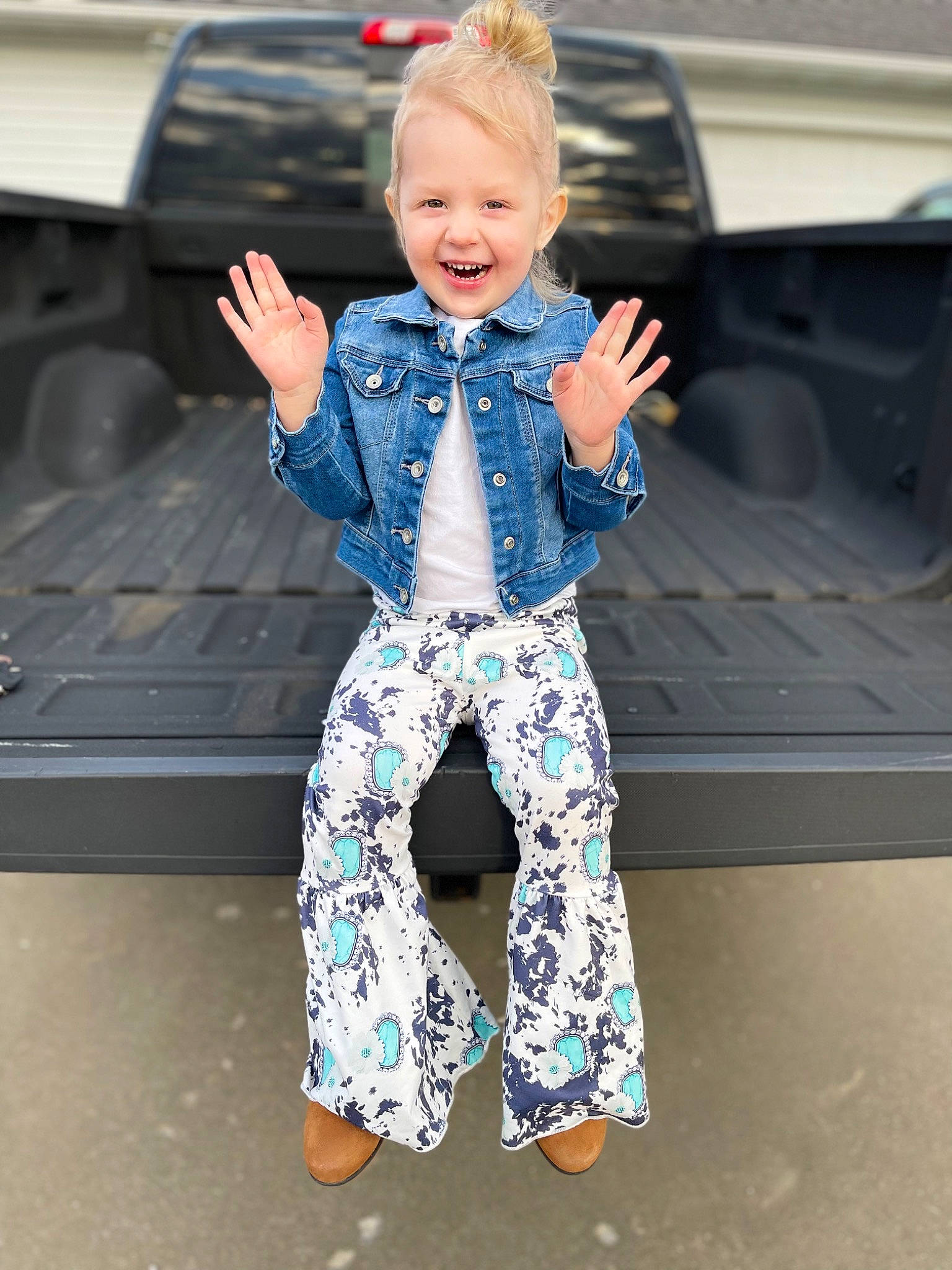 Everleigh is registered to the contest to win money with this photo: baby_toddler_clothing, child, denim, dress_shirt, electric_blue, eye, fashion_design, formal_wear, fun, hairstyle, happy, leisure, pattern, person, sitting, sleeve, smile, standing, t_shirt, toddler