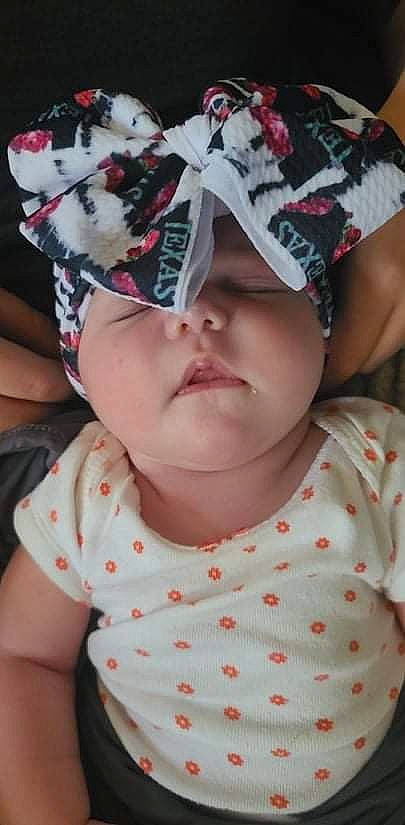 Gentry is registered to the contest to win money with this photo: baby, baby_toddler_clothing, cap, child, chin, cool, costume_hat, design, fun, happy, hat, headgear, headwear, lip, pattern, person, pink, red, skin, sleeve