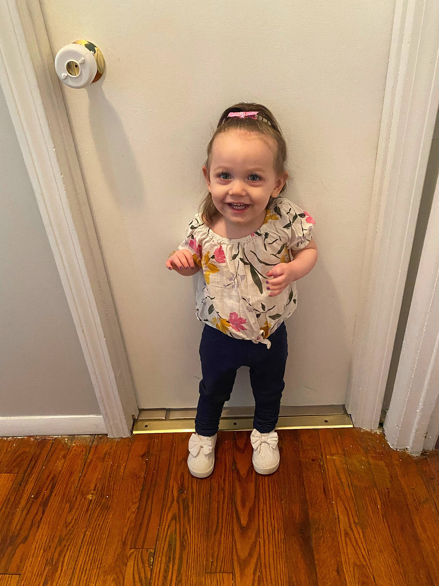 Lilyana is registered to the contest to win money with this photo: baby_toddler_clothing, beauty, child, door, floor, flooring, happy, hardwood, human_leg, joy, laminate_flooring, pattern, person, plank, sleeve, smile, standing, toddler, varnish, wood
