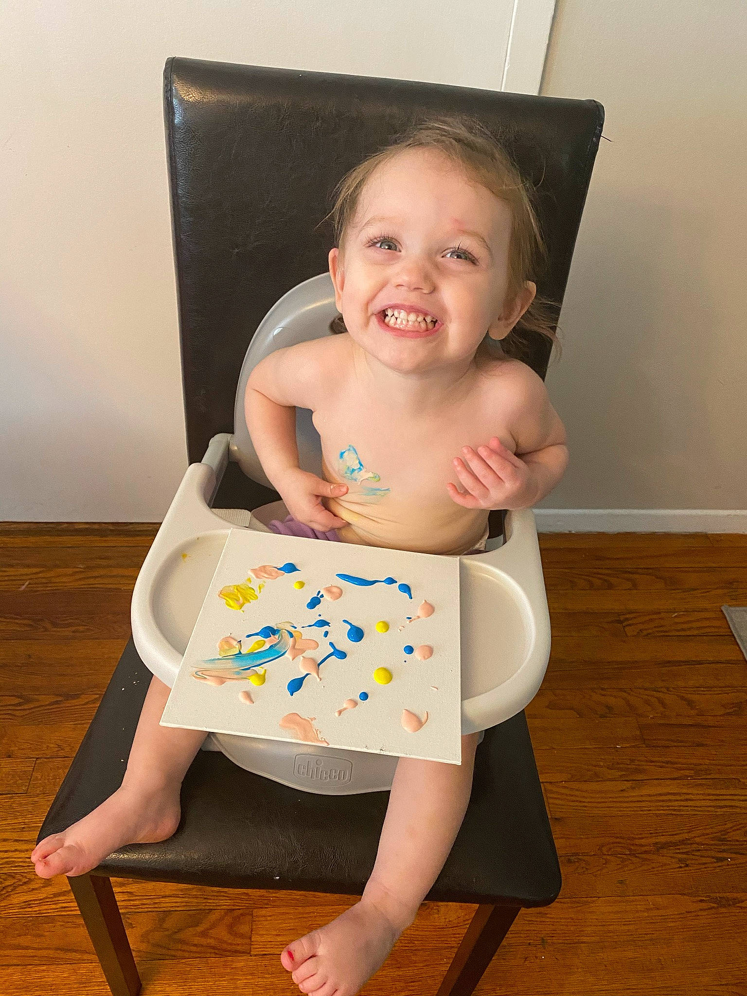 Lilyana joined the competition — help win amazing prizes! baby, baby_toddler_clothing, barefoot, child, face, flooring, fun, happy, hardwood, humour, joy, knee, pattern, person, rectangle, room, sitting, sleeve, smile, thigh