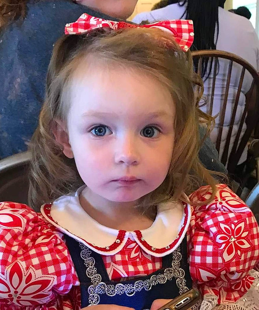 Skylar is registered to the contest to win money with this photo: baby_toddler_clothing, chair, cheek, chin, eyelash, face, fun, hair, hairstyle, happy, iris, lip, long_hair, nose, organ, person, pink, skin, snapshot, sunglasses