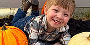 Ivan joined the competition — help win amazing prizes! child, boy, smiling, pumpkin, orange_pumpkin, white_pumpkin, plaid_shirt, jeans, boots, blanket, outdoor, fall, autumn, grass, wall, happy, portrait, casual_clothing, cute, young
