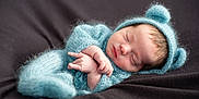 Giovanni joined the competition — help win amazing prizes! baby, bear_ears, blue_outfit, child, closed_eyes, cozy, cute, fuzzy, head, indoors, infant, knitted_clothing, newborn, peaceful, portrait, resting, sleeping, soft_blanket, tiny_hands, warm