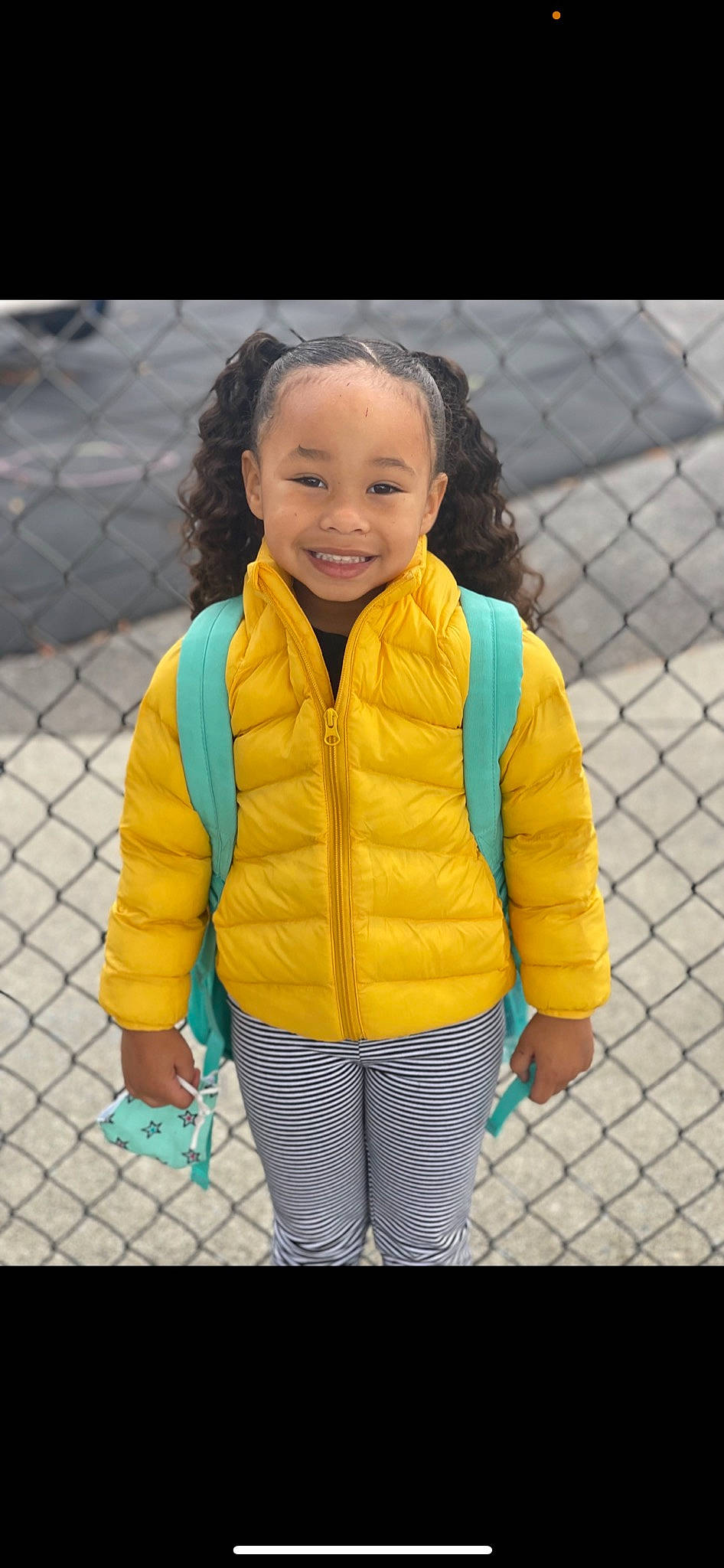 Amiyah joined the competition — help win amazing prizes! baby_toddler_clothing, child, electric_blue, face, fence, fun, grass, happy, hood, jacket, joy, leisure, mesh, pattern, person, personal_protective_equipment, player, recreation, sleeve, smile