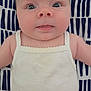 Ocean joined the competition — help win amazing prizes! baby, infant, face, eyes, tongue, white_clothing, patterned_blanket, skin, cute, child, portrait, lying_down, closeup, young, adorable, person, baby_garment, soft_skin, expression, indoors