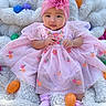 Miyori joined the competition — help win amazing prizes! baby, blanket, child, colorful, cozy, cute, embroidery, fabric, flower, happy, headband, infant, outdoor, pink_dress, plastic_eggs, portrait, purple_socks, sitting, smile, soft_texture