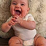 baby, infant, smiling, happy, clapping, onesie, diaper, sitting, cute, chubby, skin, face, expression, hands, feet, texture, blanket, indoors, child, person