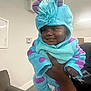 Robert joined the competition — help win amazing prizes! baby, blue, child, clothing, costume, cozy, cute, face, fuzzy, hand, happy, holding, horns, indoor, infant, person, plush, portrait, purple, smile