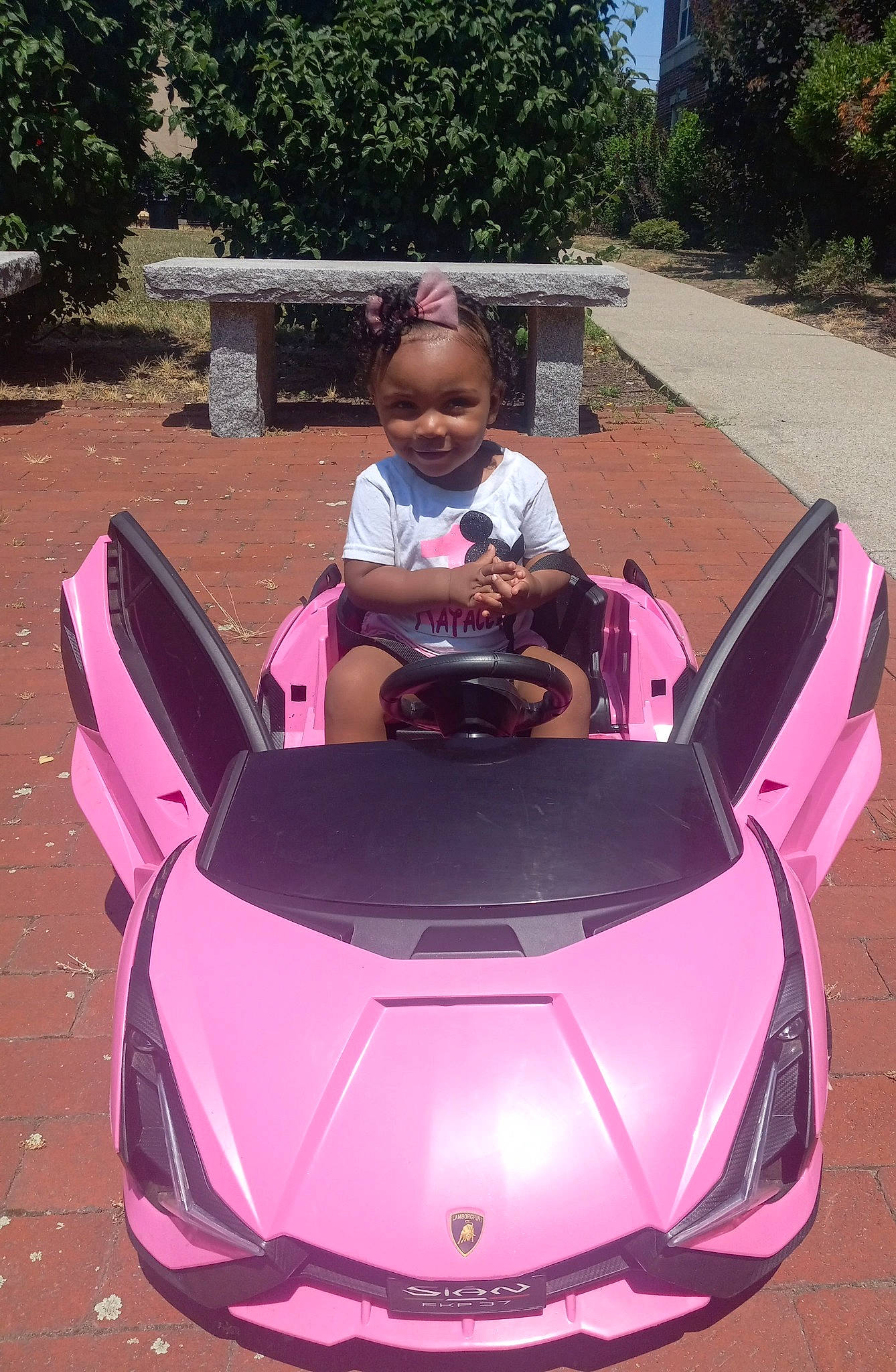 Kataleya joined the competition — help win amazing prizes! automotive_design, automotive_exterior, automotive_lighting, beauty, bumper, car, eye, head, headlamp, hood, joy, motor_vehicle, person, personal_luxury_car, pink, plant, tire, toddler, tree, vehicle