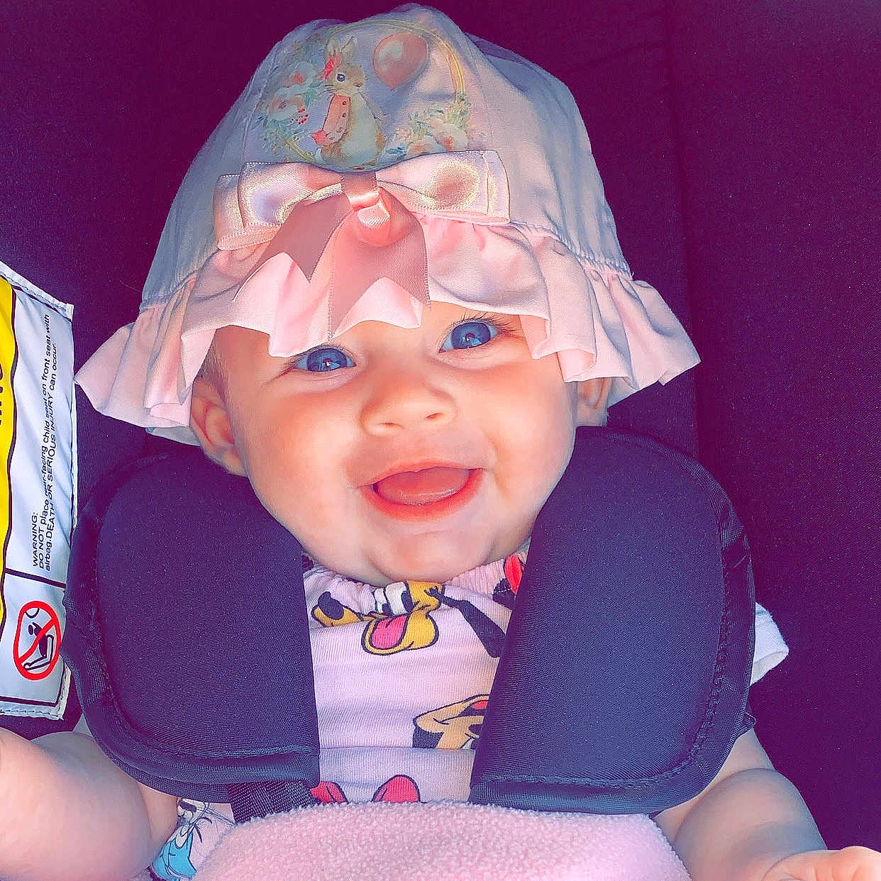 Darcie-Marie joined the competition — help win amazing prizes! baby, baby_girl, blanket, blue_eyes, car_seat, child, clothing, comfort, cute, face, happy, hat, indoors, infant, pink_hat, portrait, satin_bow, seat_belt, smiling, soft
