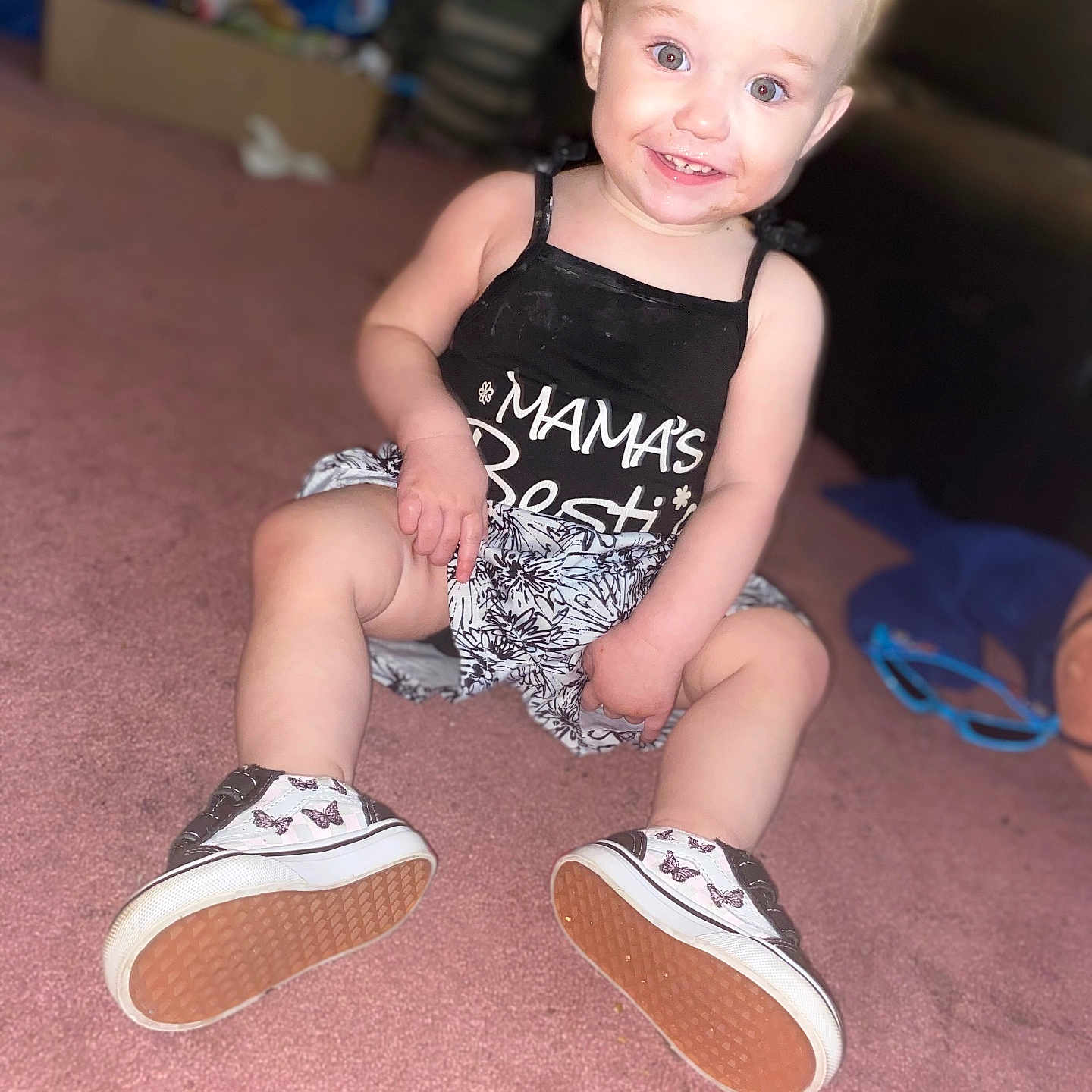 Mckenna Winchell is registered to the contest to win money with this photo: baby, ball, clothing, couch, dress, face, footwear, furniture, head, pants, person, photography, portrait, runningshoe, sandal, shoe, shorts, sitting, sneaker, t_shirt
