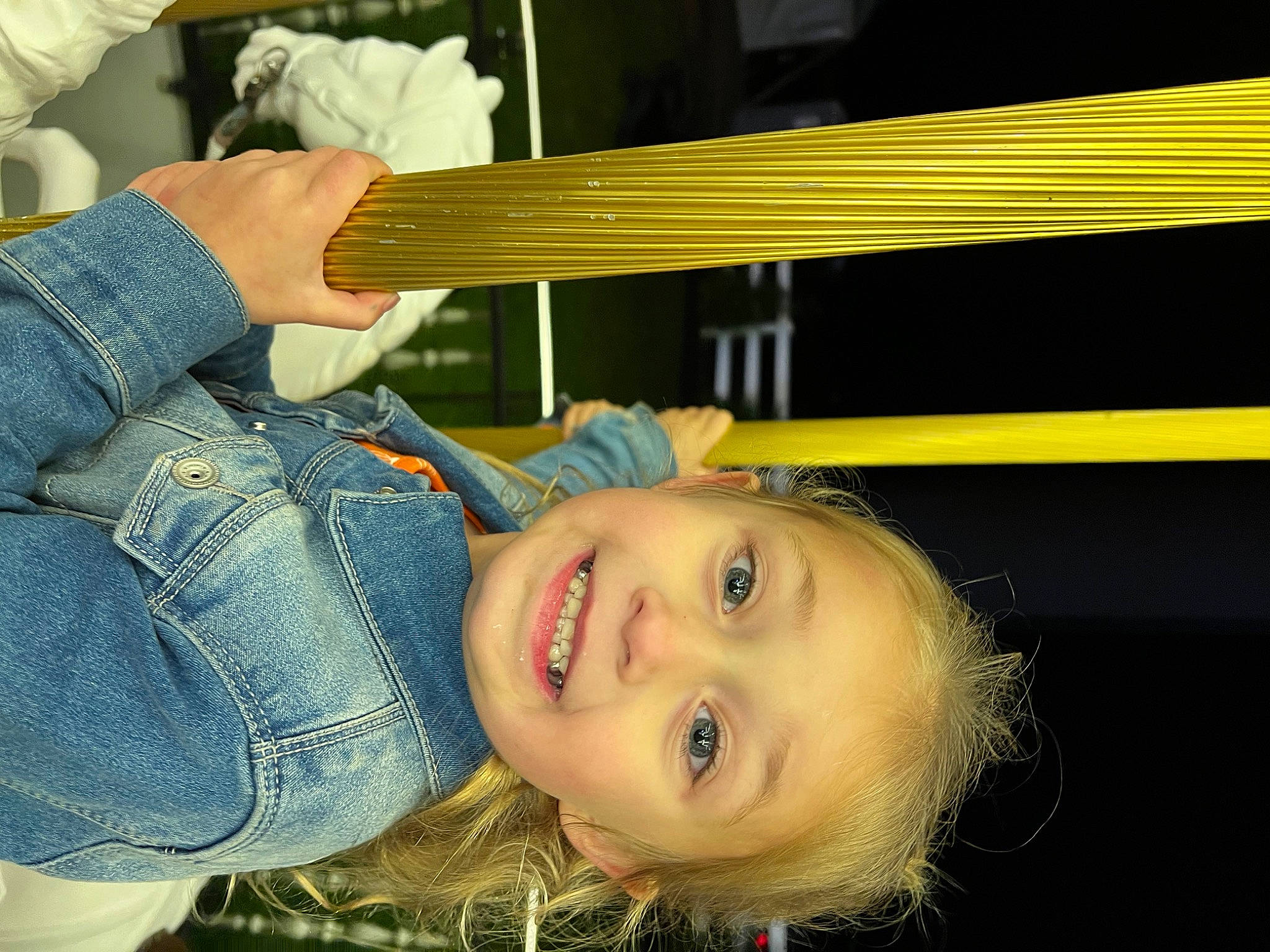 Charleigh is registered to the contest to win money with this photo: cheek, child, denim, electric_blue, eyelash, flash_photography, fun, gesture, happy, iris, jeans, joy, leisure, lip, mouth, nose, person, sitting, skin, smile