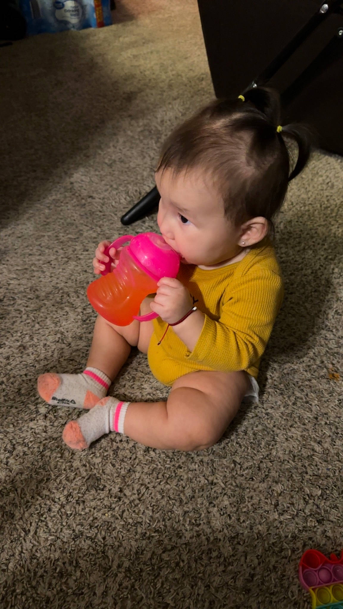 Mia joined the competition — help win amazing prizes! baby, baby_playing_with_toys, baby_products, baby_toddler_clothing, baby_toys, child, eye, finger, flooring, foot, fun, grass, happy, human_leg, magenta, nail, person, sitting, thumb, toddler