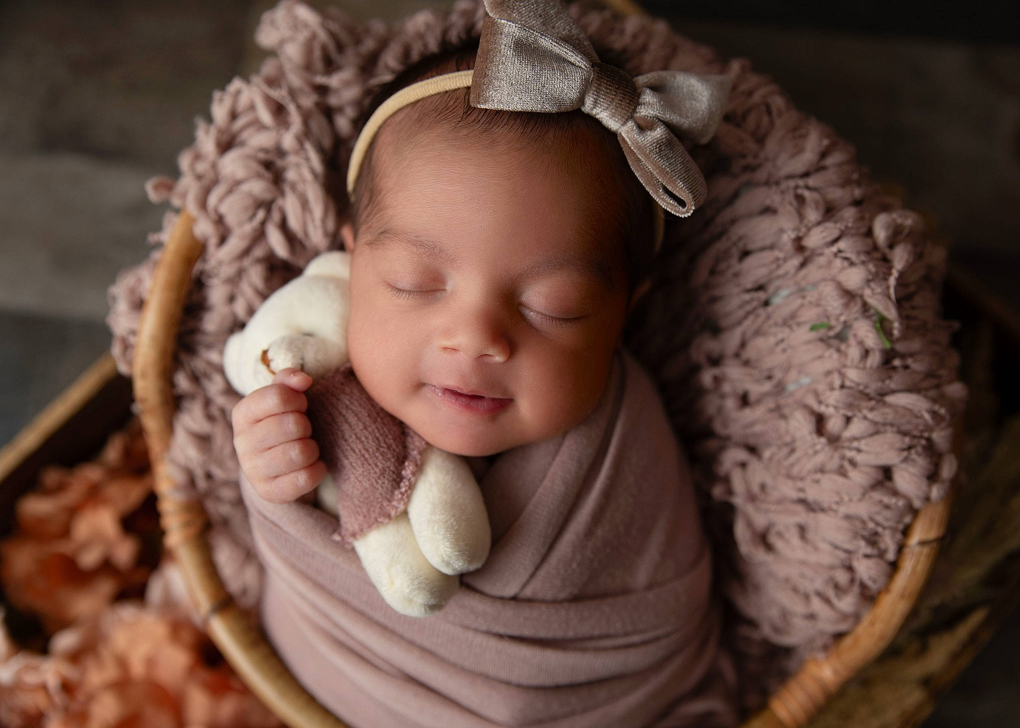 Arielle is registered to the contest to win money with this photo: baby, baby_products, baby_toddler_clothing, beanie, cap, cheek, eye, fashion_accessory, flash_photography, grass, happy, iris, knit_cap, linens, person, skin, textile, toddler, wood, wool