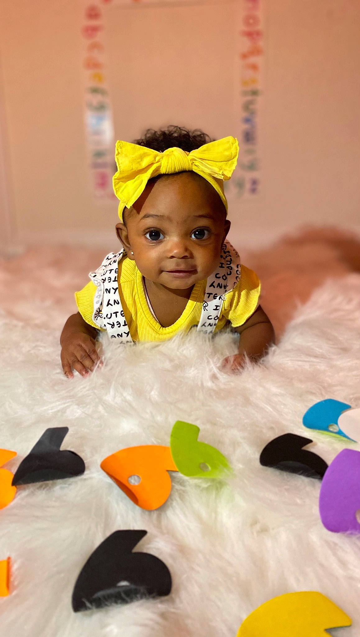Kassidy is registered to the contest to win money with this photo: baby, baby_products, baby_toddler_clothing, baby_toys, child, child_model, costume, costume_accessory, hair_accessory, headband, headgear, headpiece, person, toddler, yellow