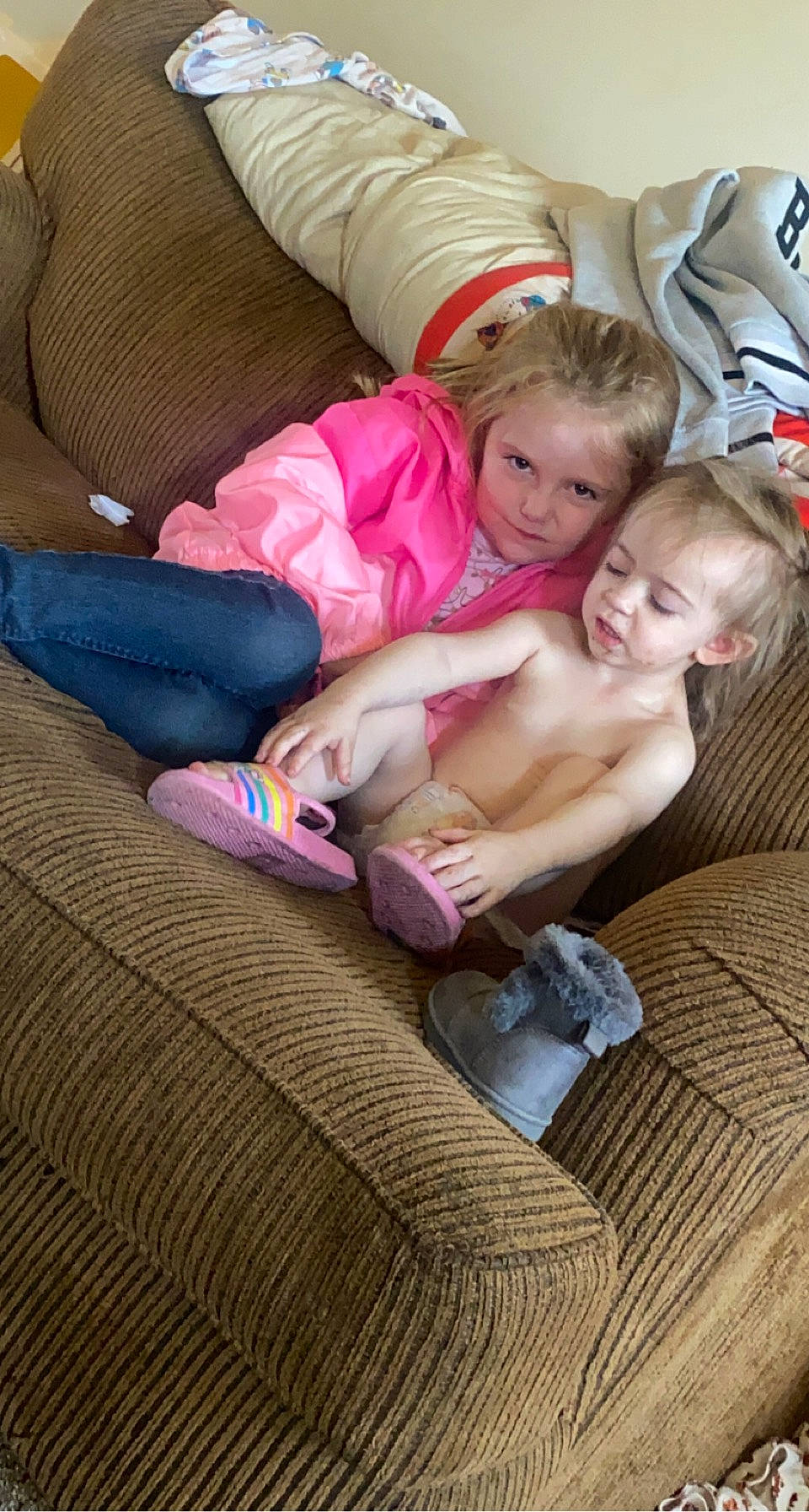 Kamari joined the competition — help win amazing prizes! baby, barefoot, bedding, bedtime, child, comfort, foot, fun, grass, happy, head, human_leg, lap, linens, person, room, sitting, smile, textile, thigh