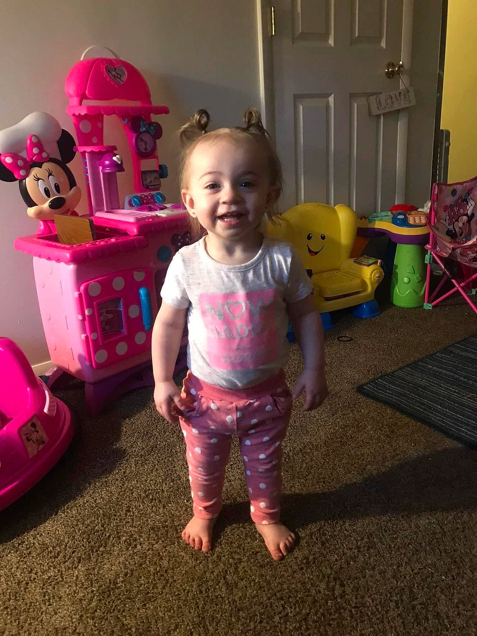 Kamari joined the competition — help win amazing prizes! baby, baby_toddler_clothing, barefoot, child, floor, flooring, fun, happy, head, joy, magenta, person, pink, play, room, shorts, smile, standing, t_shirt, toddler