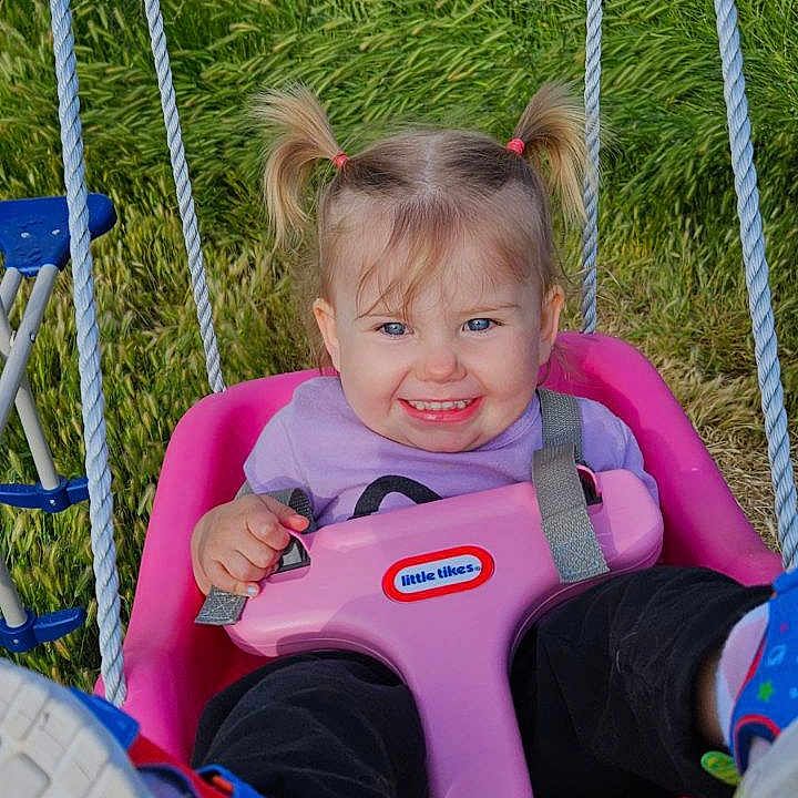 Aria is registered to the contest to win money with this photo: backyard, child, clothing, face, female, footwear, girl, grass, head, nature, outdoorplayarea, outdoors, park, person, photography, plant, playarea, portrait, summer, yard