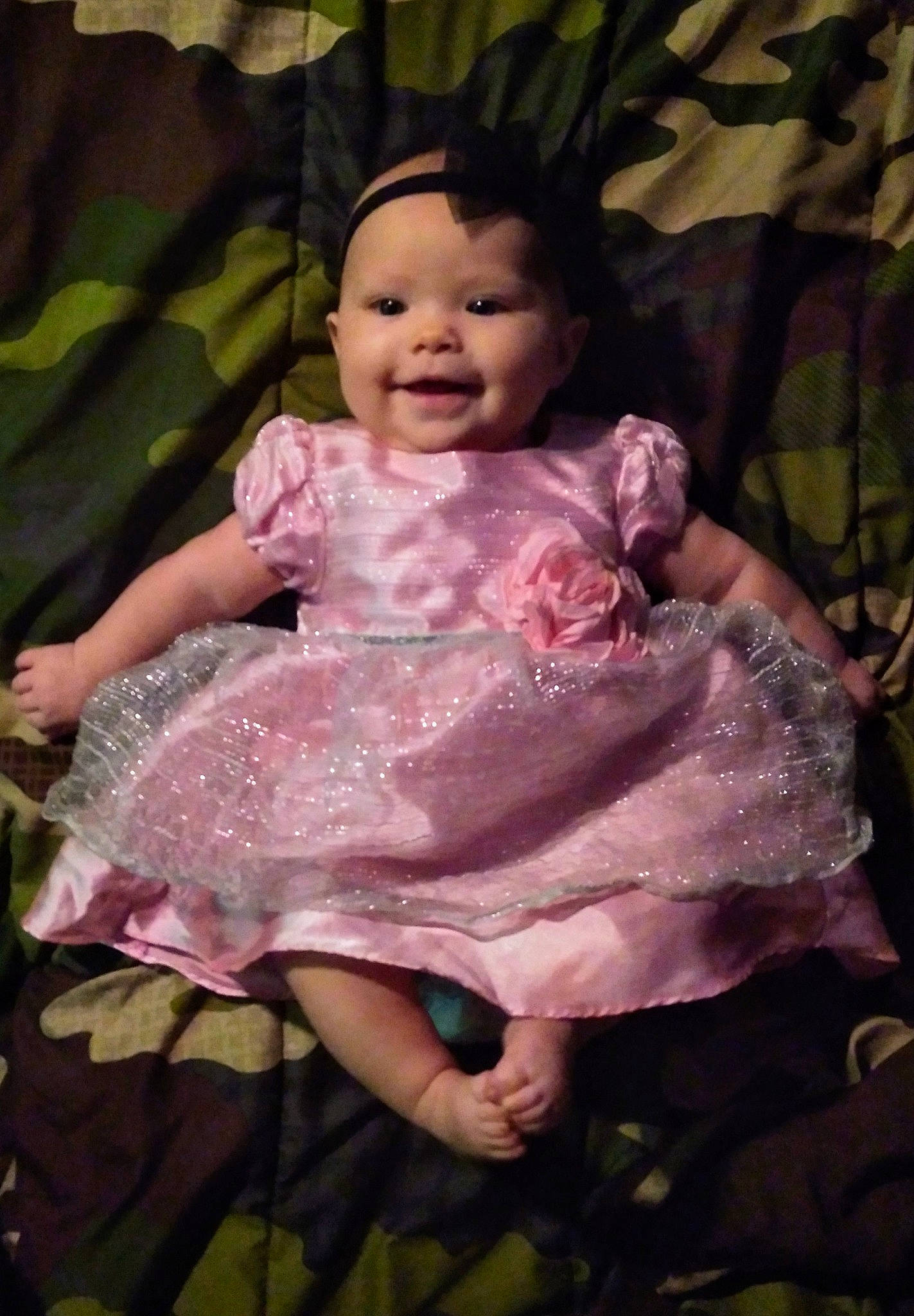 Emmalynn is registered to the contest to win money with this photo: baby, baby_products, cheek, child, dress, eye, head, iris, joy, person, photography, pink, plant, portrait, product, purple, sitting, skin, smile, toddler