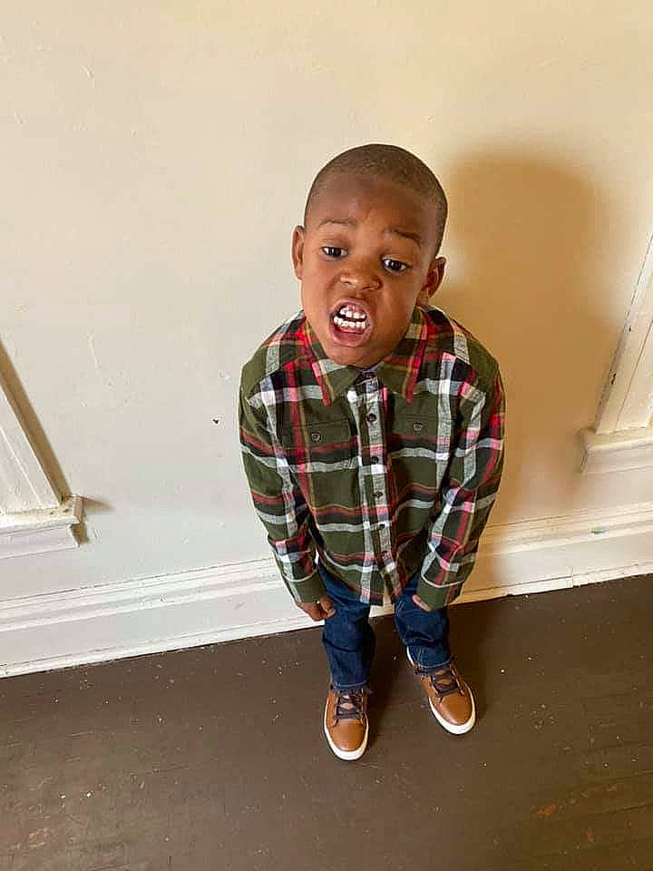 Javontae joined the competition — help win amazing prizes! child, design, floor, flooring, happy, pattern, person, plaid, room, shoe, sitting, skin, smile, standing, toddler