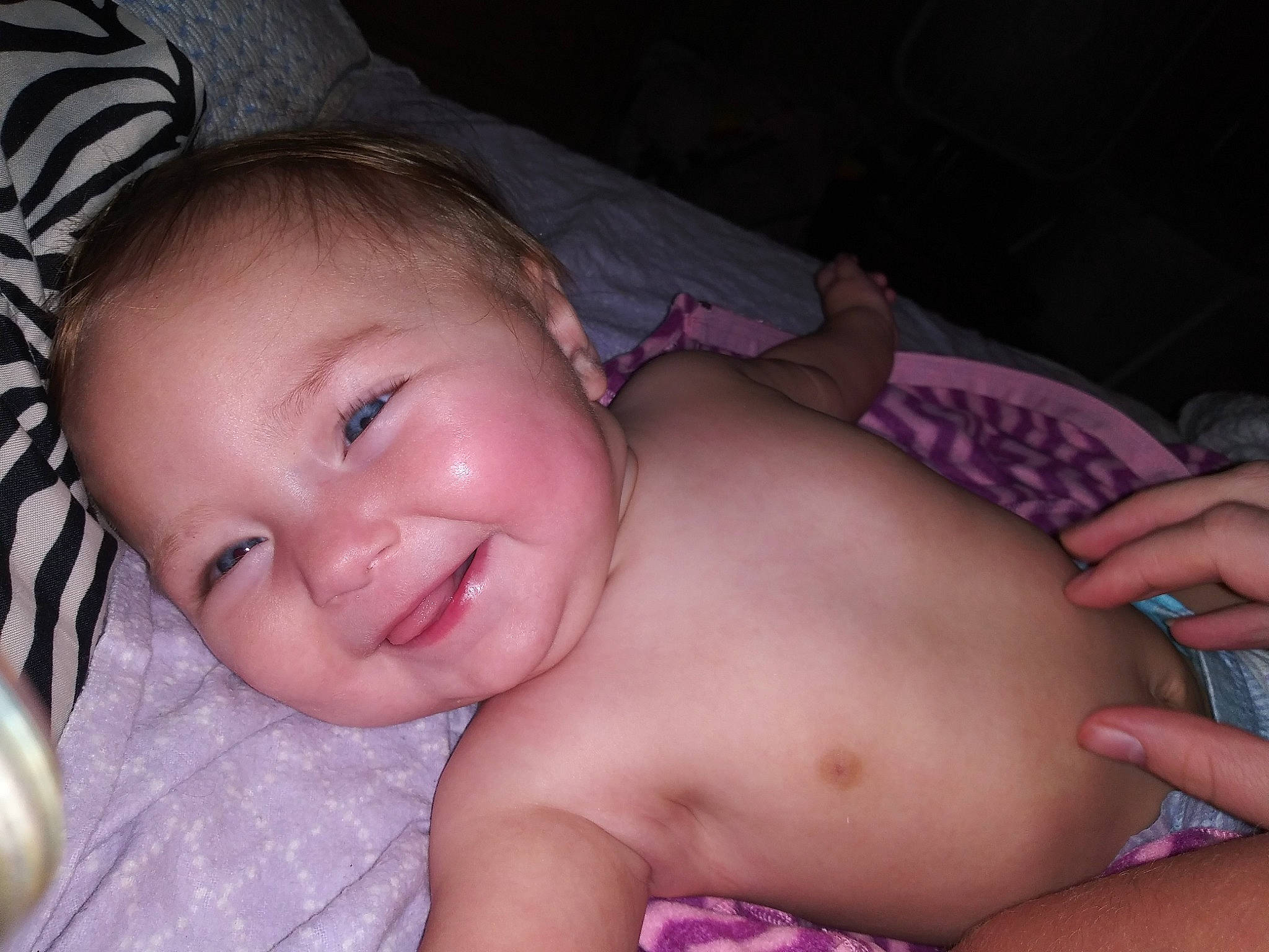 Jane is registered to the contest to win money with this photo: abdomen, baby, black_hair, cheek, chest, child, close_up, face, finger, hand, head, joy, lip, mouth, muscle, neck, nose, person, skin, stomach