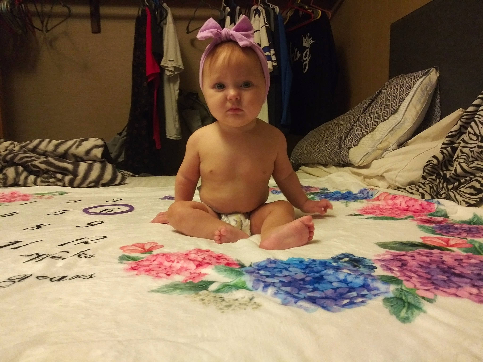 Jane joined the competition — help win amazing prizes! baby, child, finger, linens, person, pink, play, sitting, skin, textile, toddler