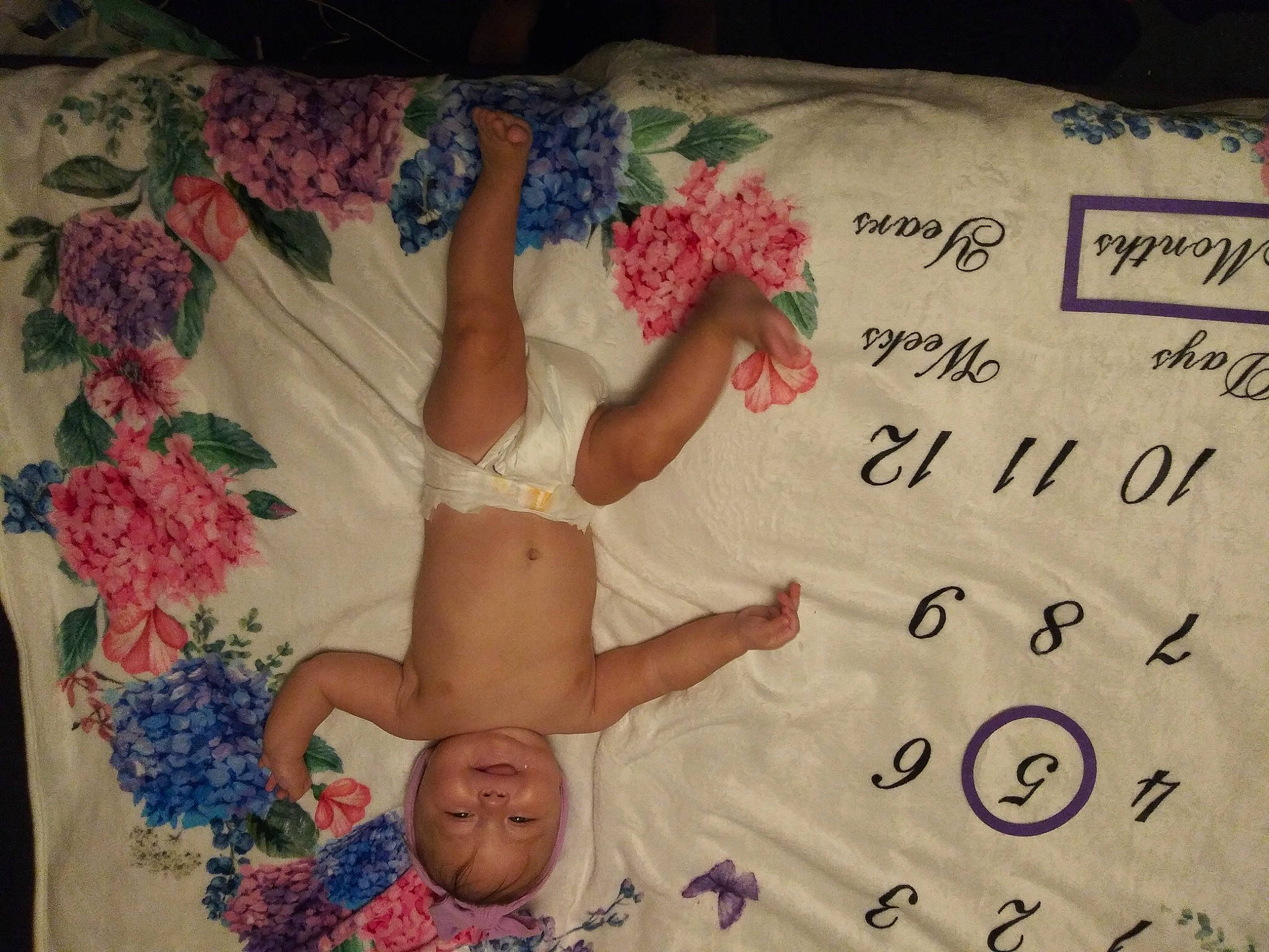 Jane is registered to the contest to win money with this photo: arm, baby, child, drawing, finger, gesture, hand, happy, human, illustration, leg, person, plant, skin, textile, toddler, tree