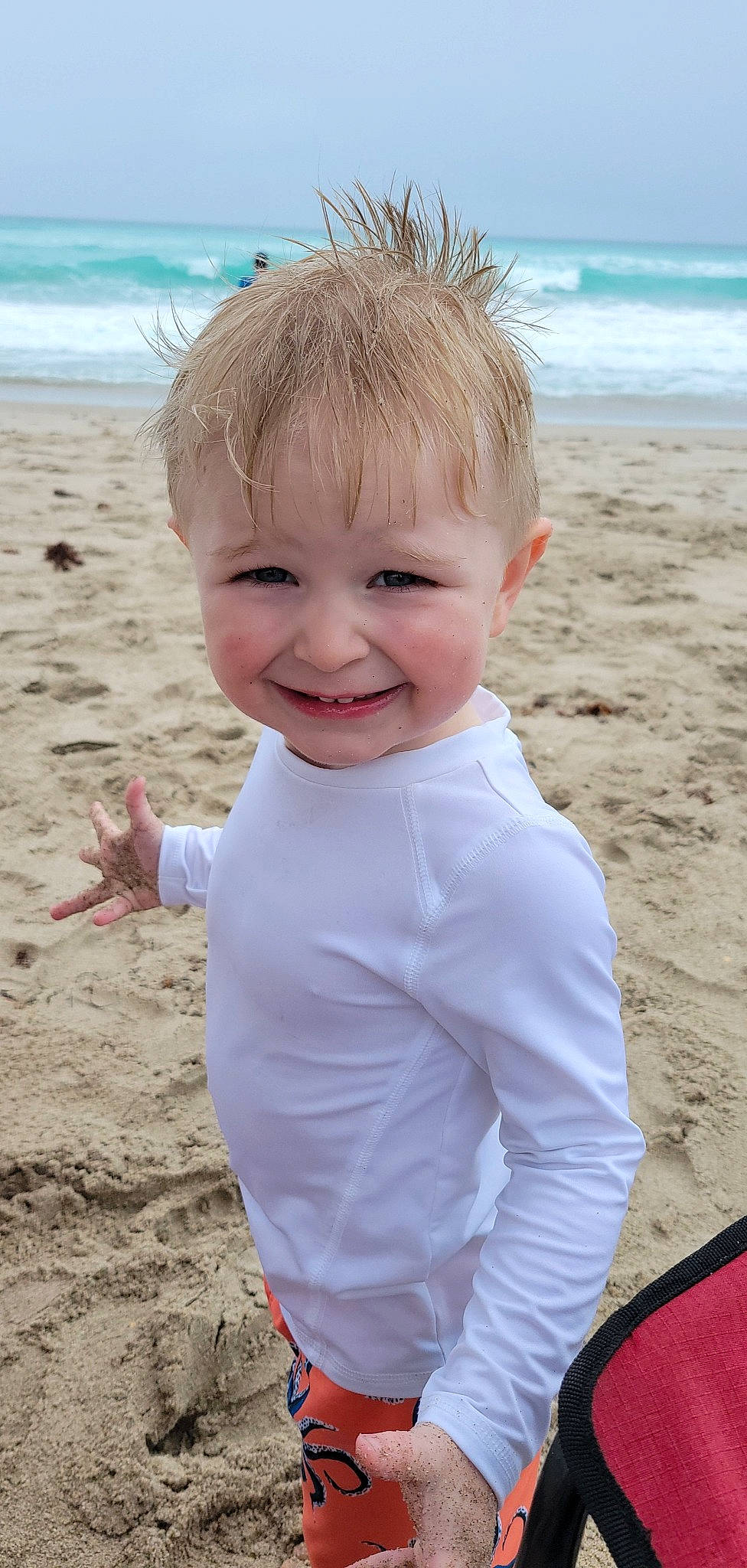 Bentley joined the competition — help win amazing prizes! baby_toddler_clothing, beach, child, cool, facial_expression, fun, hairstyle, happy, human, joy, leisure, natural_environment, nose, people_in_nature, people_on_beach, person, sleeve, smile, standing, summer