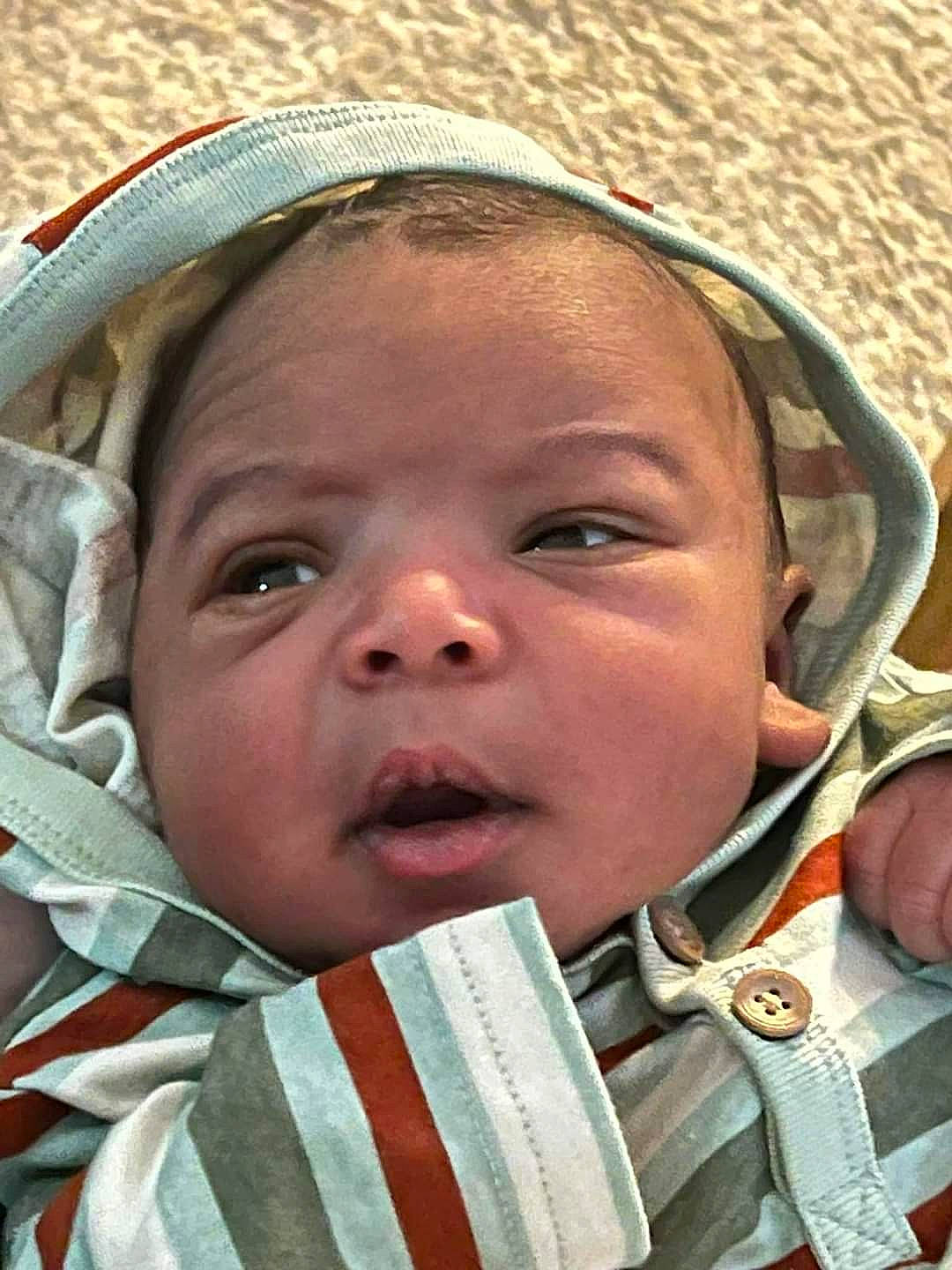 Supreme is registered to the contest to win money with this photo: cheek, child, chin, eye, eyebrow, eyelash, face, forehead, happy, head, headgear, iris, lip, mouth, nose, organ, person, skin, smile, toddler