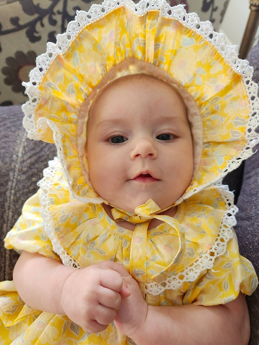 Riley joined the competition — help win amazing prizes! baby, baby_products, baby_toddler_clothing, beauty, cheek, child, dress, event, eye, face, fashion_accessory, fun, grass, happy, iris, person, photograph, pink, skin, toddler