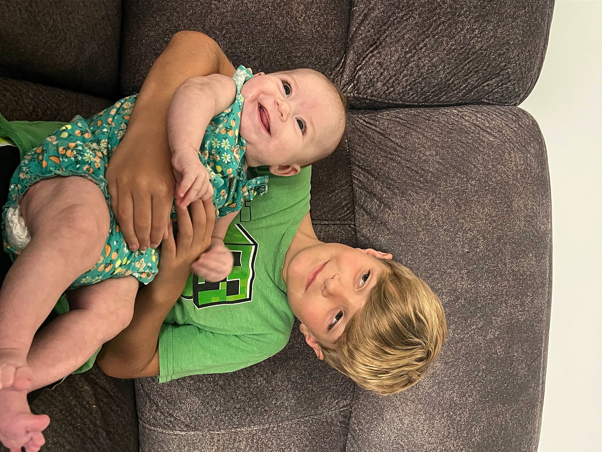 Riley joined the competition — help win amazing prizes! abdomen, baby, baby_toddler_clothing, child, comfort, couch, elbow, flash_photography, grass, happy, human_body, human_leg, joy, knee, leg, person, skin, smile, thigh, toddler