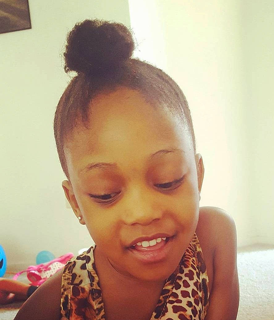 Trinity is registered to the contest to win money with this photo: beauty, black_hair, bun, cheek, child, ear, eyebrow, eyelash, fashion_accessory, forehead, fun, happy, iris, jaw, joy, lip, long_hair, makeover, neck, nose