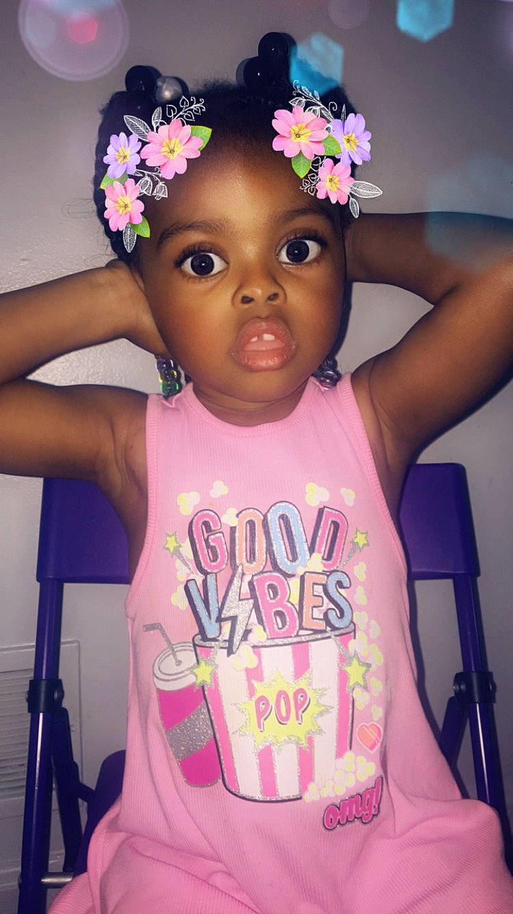 Kenneth joined the competition — help win amazing prizes! baby, baby_toddler_clothing, child, cool, eye, facial_expression, finger, flash_photography, flower, happy, headgear, headwear, iris, magenta, person, petal, pink, purple, skin, toddler