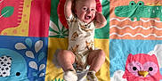 Jaxson joined the competition — help win amazing prizes! baby, cartoon_animals, child, colorful, crocodile, cute, elephant, fun, giraffe, happy, indoors, infant, lying_down, onesie, owl, person, play_mat, playful, smiling, socks