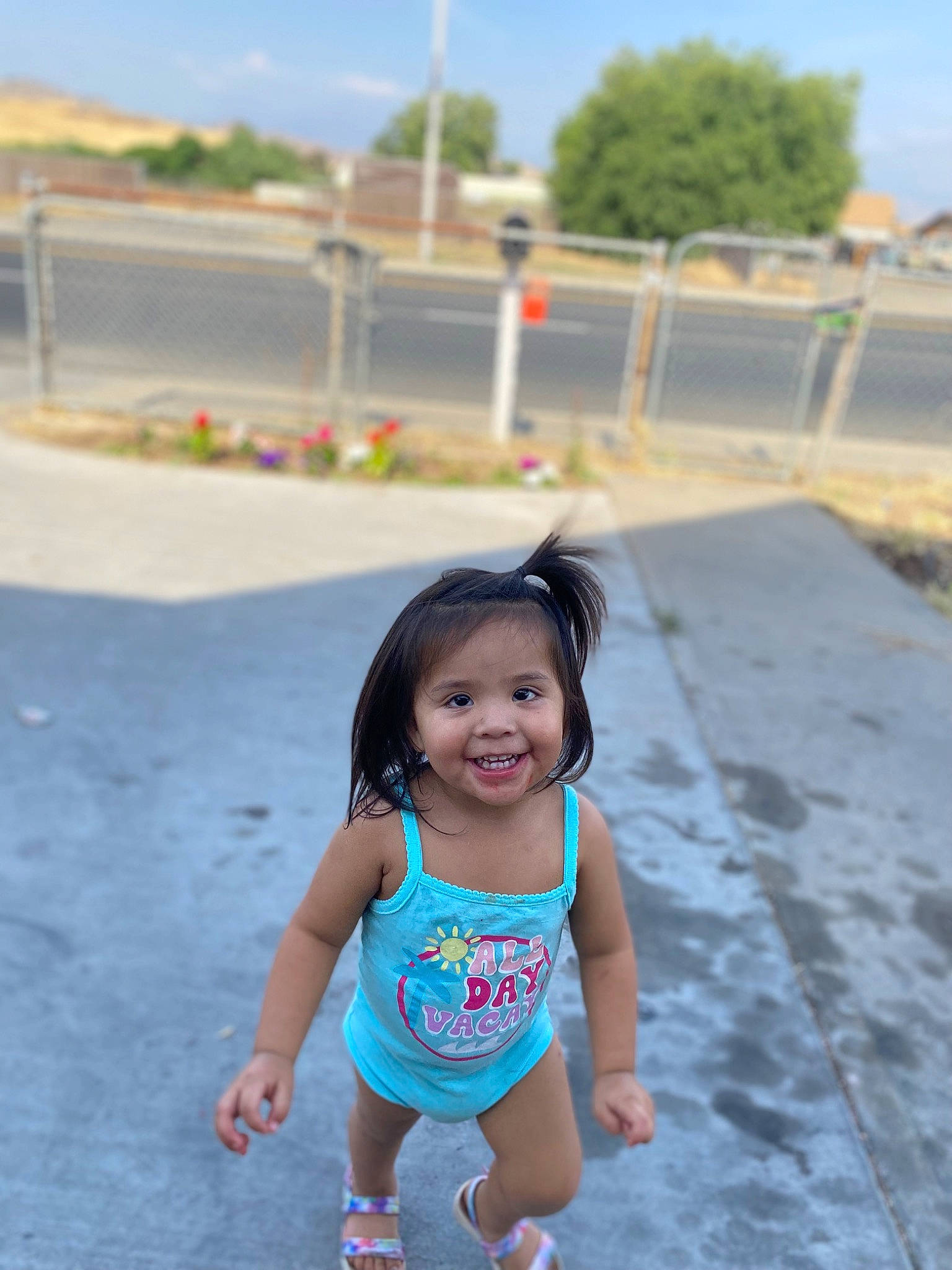 Renezmae joined the competition — help win amazing prizes! asphalt, baby, child, city, eye, fun, happy, joy, leisure, magenta, person, recreation, road, sand, shorts, sitting, sky, summer, t_shirt, toddler