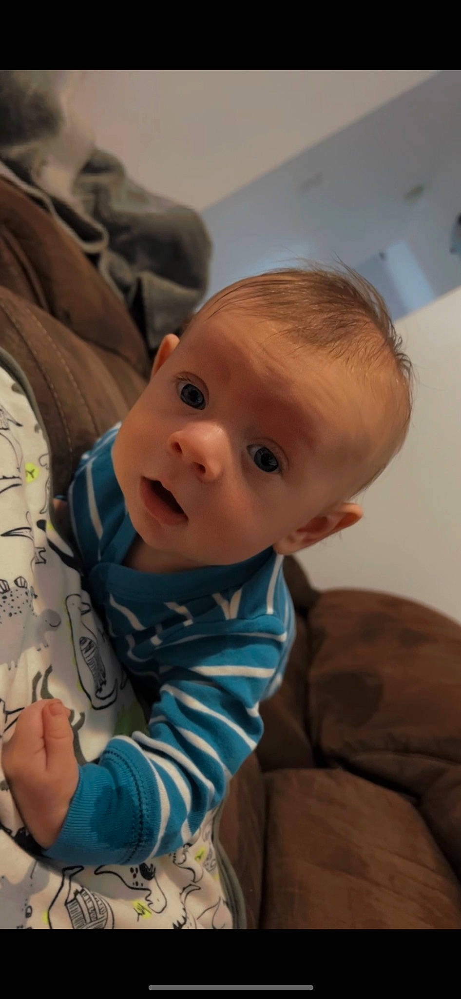 Keaton joined the competition — help win amazing prizes! baby, baby_toddler_clothing, cheek, child, comfort, flooring, fun, happy, iris, linens, lip, nose, pattern, person, room, sitting, skin, sleeve, surprise, toddler