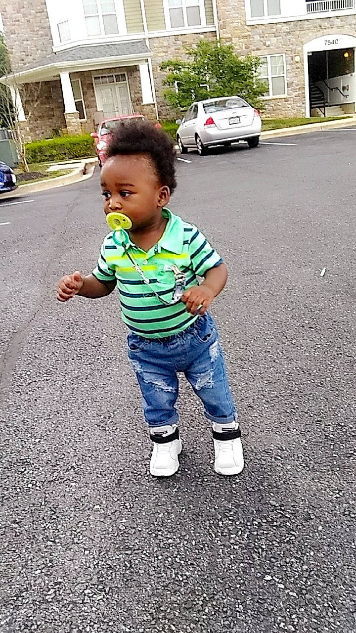 Jewel is registered to the contest to win money with this photo: asphalt, child, denim, jeans, person, play, road, shoe, toddler