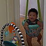 Khamari joined the competition — help win amazing prizes! baby, infant, child, jumper, baby_jumper, indoor, carpet, toy, activity_gym, play, happiness, smile, motion, home, doorway, green_straps, black_and_white_stripes, colorful, cute, fun