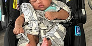 Khamari joined the competition — help win amazing prizes! baby, sleeping, blanket, car_seat, toy, lion, foot, hand, indoors, infant, child, cute, peaceful, black, gray, fabric, comfort, rest, toddler, portrait